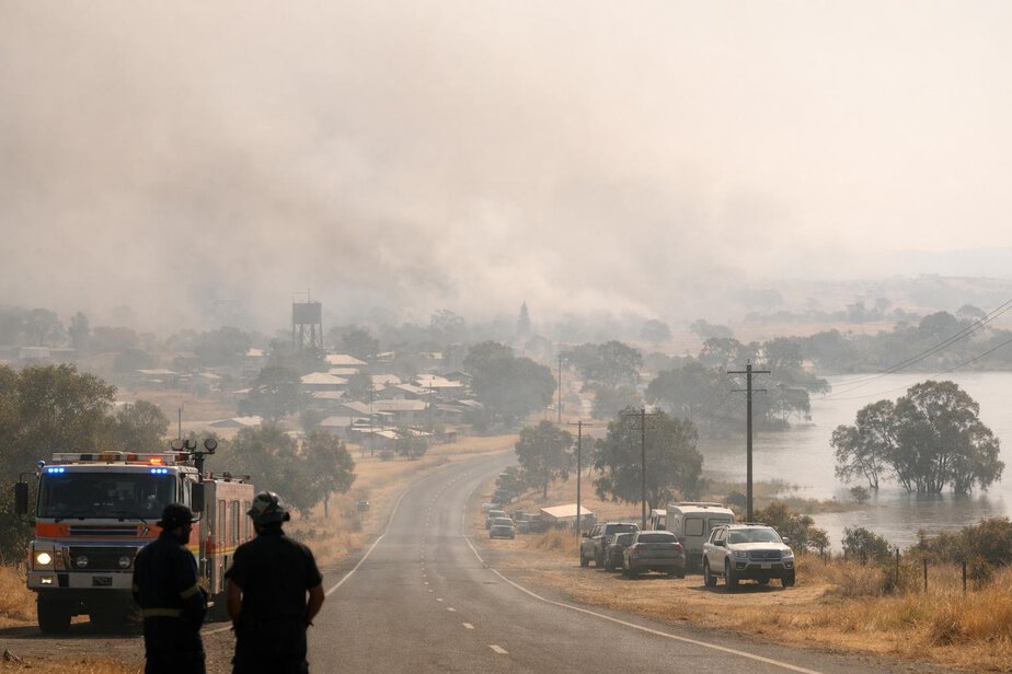 Smoke haze reducing visibility over a rural Australian landscape.